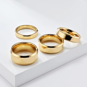 Macro shot of 45-degree beveled edge gold polished tungsten steel rings in various widths