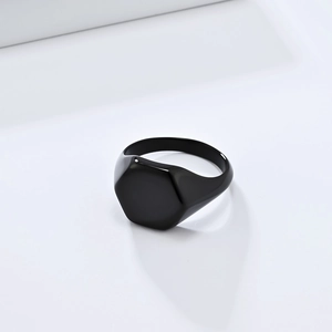 Minimalist black hexagon signet ring in titanium steel with a sleek matte finish