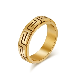 Bague rotative dorée minimaliste ornée d'un motif de méandre grec classique élégant