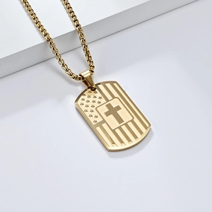 Gold stainless steel dog tag cross pendant necklace detail view, fashion jewelry accessory.