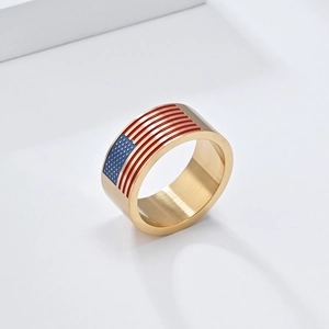 Detailed view of wide gold titanium ring featuring American flag stars and stripes pattern