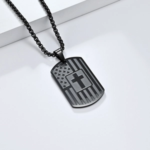 Detailed view of the black stainless steel cross dog tag pendant necklace with patriotic motif.