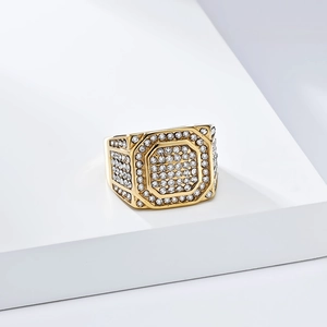 Macro detail of luxury iced out gold hip hop ring with sparkling zircon stones