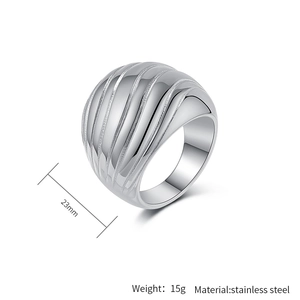 Detail view of 23mm wide silver stainless steel wavy ring with polished finish