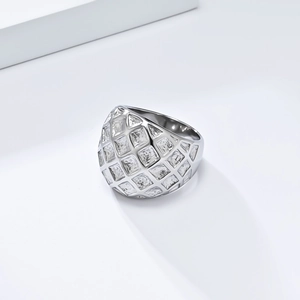 Close-up of wide mesh pattern gold-plated stainless steel ring with stone textures