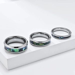 Polished tungsten steel rings featuring colorful abalone shell inlays in three widths