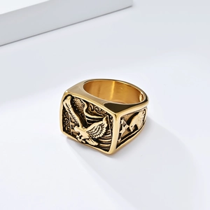 Vintage golden eagle signet ring with American flag details and antique finish