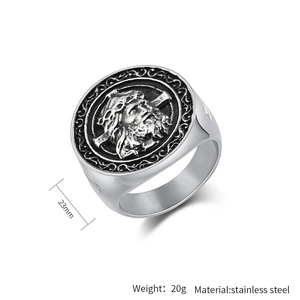 Detail view of vintage stainless steel crucifix signet ring showing 23mm size and 20g weight