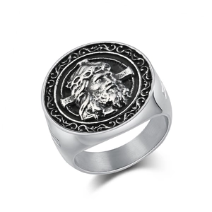 Vintage men's stainless steel signet ring with embossed cross design and oxidized finish