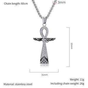 Macro detail of Egyptian Ankh cross pendant with eye of Horus wings in stainless steel
