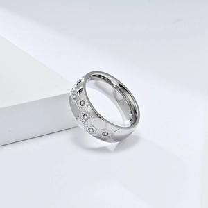 Polished stainless steel soccer ring with hexagonal pattern and sparkling zircons