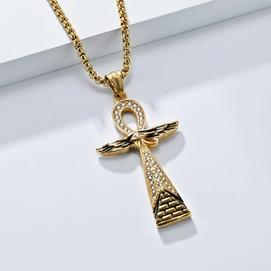 Golden Ankh necklace with Eye of Horus wings and pyramid on tiered white stands