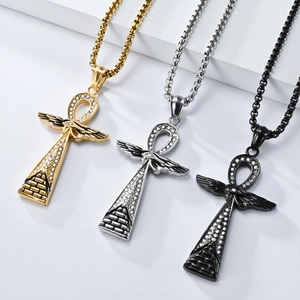 Vintage Ankh cross necklaces in gold, silver, and black with rhinestones on white stands