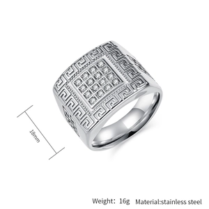 Detail showing 18mm wide stainless steel signet ring with cubic zirconia and Greek key pattern