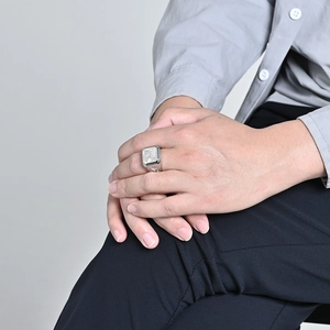 Men's silver eagle signet ring in 18K gold-plated stainless steel worn on hand