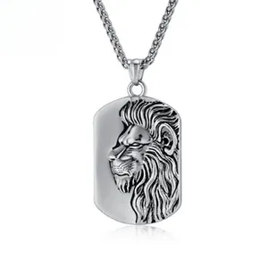 Macro detail of 3D embossed lion head dog tag pendant on silver stainless steel chain