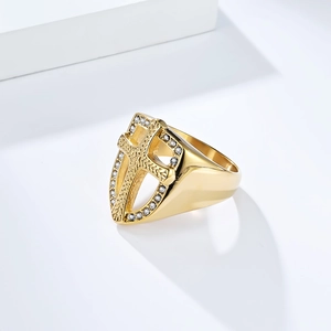 Men's vintage gold shield ring with textured cross and sparkling crystal frame