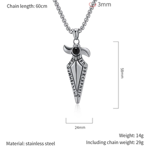 Macro view of Nordic rune spearhead pendant with black gemstone inlay in silver finish