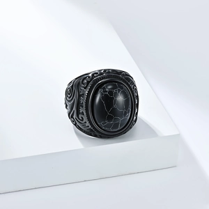 Anello vintage in acciaio inossidabile con pietra nera ovale e incisioni floreali