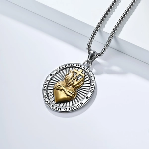 Macro shot of Sacred Heart of Jesus stainless steel pendant with radiant cross detail
