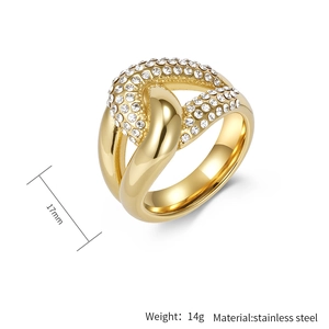 Macro view of 18K gold plated stainless steel knot ring with crystal pavé and 17mm size