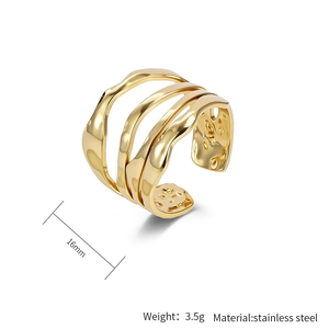 Macro detail of gold wave ring showing 16mm diameter size and 3.5g stainless steel weight