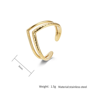 Detail of 18K gold-plated stainless steel double layer open ring with textured band