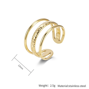 Detail view of 18K gold plated triple layered ring with hammered texture and 12mm width