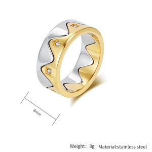Detail of 8mm two-tone stainless steel wave ring with cubic zirconia inlay stones