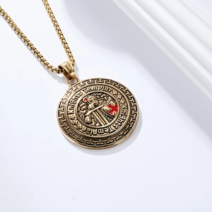 Detail of vintage gold Knights Templar shield pendant with red cross and sturdy chain