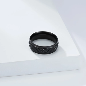 Men's black stainless steel ring with geometric diamond pattern and matte finish