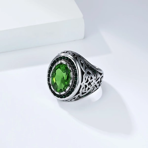 Retro men's stainless steel ring with a large oval green gemstone and Celtic patterns