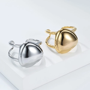 Polished gold and silver stainless steel rings with geometric triangle block design
