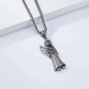 Detail of Santa Muerte reaper pendant with inlaid rhinestones and wheat chain