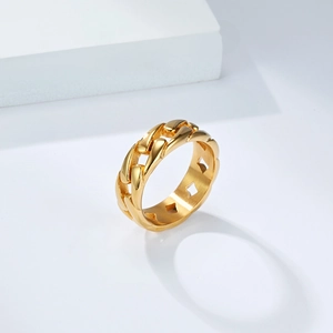 Detailed macro view of the golden cuban link ring with diamond cutout inner design