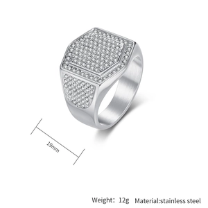 Close-up of luxury gold-plated stainless steel ring showing iced-out zircon details