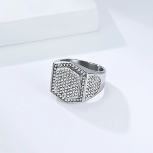 Detail of silver iced-out hexagonal signet ring with micro-pave crystals for men