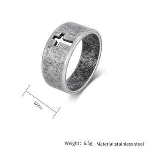 Detail view of 10mm wide vintage stainless steel cross ring with matte finish