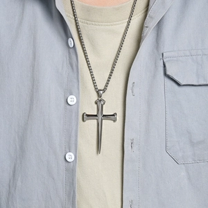 Men's titanium steel cross necklace featuring a unique nail cross pendant on a chain