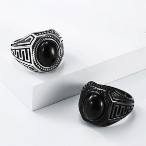 Retro titanium steel men's ring with oval black gemstone and geometric patterns