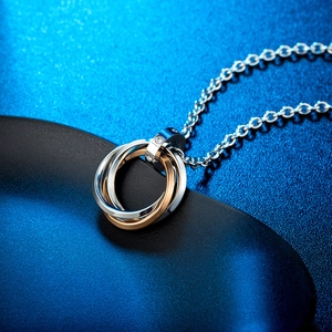 Three-tone interlocking ring pendant necklace in polished titanium steel for men