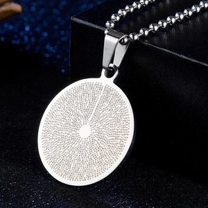 Macro view of titanium steel pendant featuring laser-engraved Buddhist scriptures