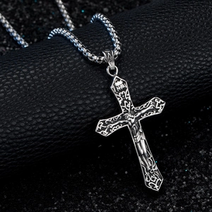 Vintage stainless steel crucifix pendant necklace with INRI relief on black leather