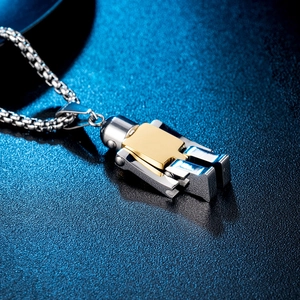 Detailed close-up of a two-tone titanium steel robot pendant on a box chain for men