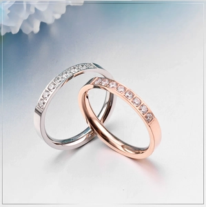 Elegant rose gold and silver interlocking rings with sparkling crystals for women