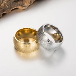 Vintage stainless steel ring set in gold and silver with Buddhist heart sutra engraving