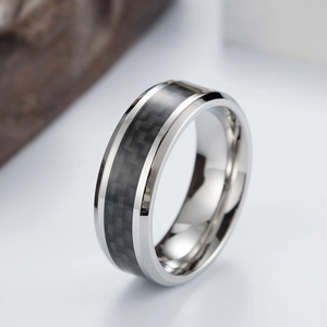 Polished titanium steel ring for men with black carbon fiber inlay and mirror finish
