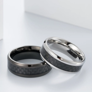 Polished titanium steel rings with black carbon fiber inlay in silver and black colors