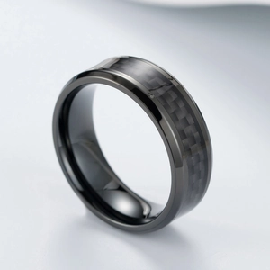 Polished black titanium steel ring featuring a carbon fiber inlay for men and teens