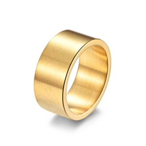 Detail of wide gold-plated stainless steel ring with elegant vertical brushed texture